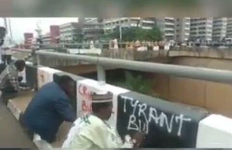 Shi’ite Members Write ‘Tyrant Buhari’ all over Abuja roads During El-Zakzaky Protest (photos)